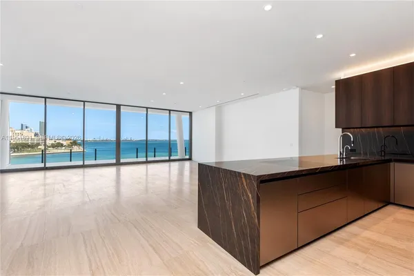 a room with a table and chairs