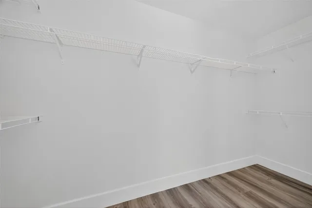 a view of a room with racks on the wall