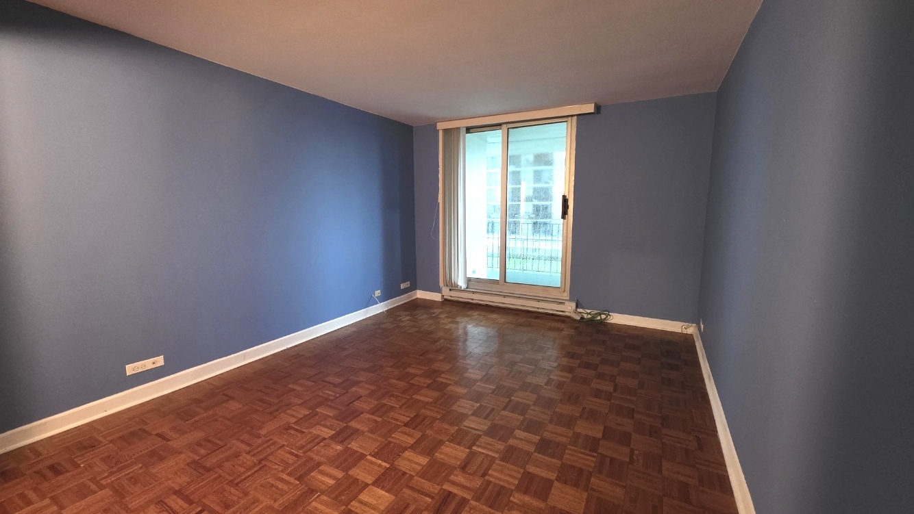 6033 North Sheridan Road, Unit 5G Chicago, IL 60660 - Photo 13 of 24 an empty room with a window