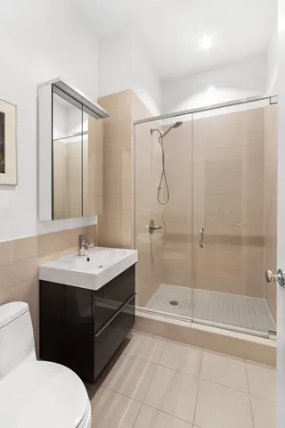 a bathroom with a toilet a sink and a bathtub