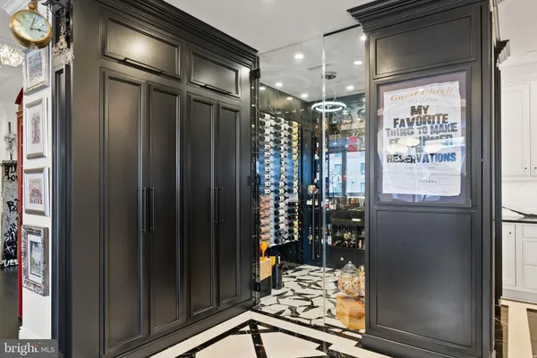 a spacious bathroom with a double vanity sink mirror and shower