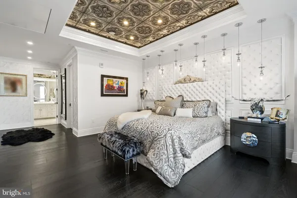 a view of hallway with wooden floor