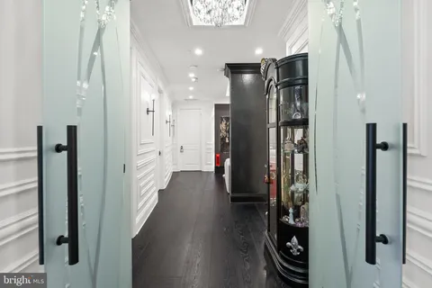 a kitchen with granite countertop a sink and cabinets