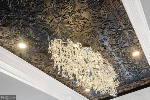 a view of a swimming pool with chairs