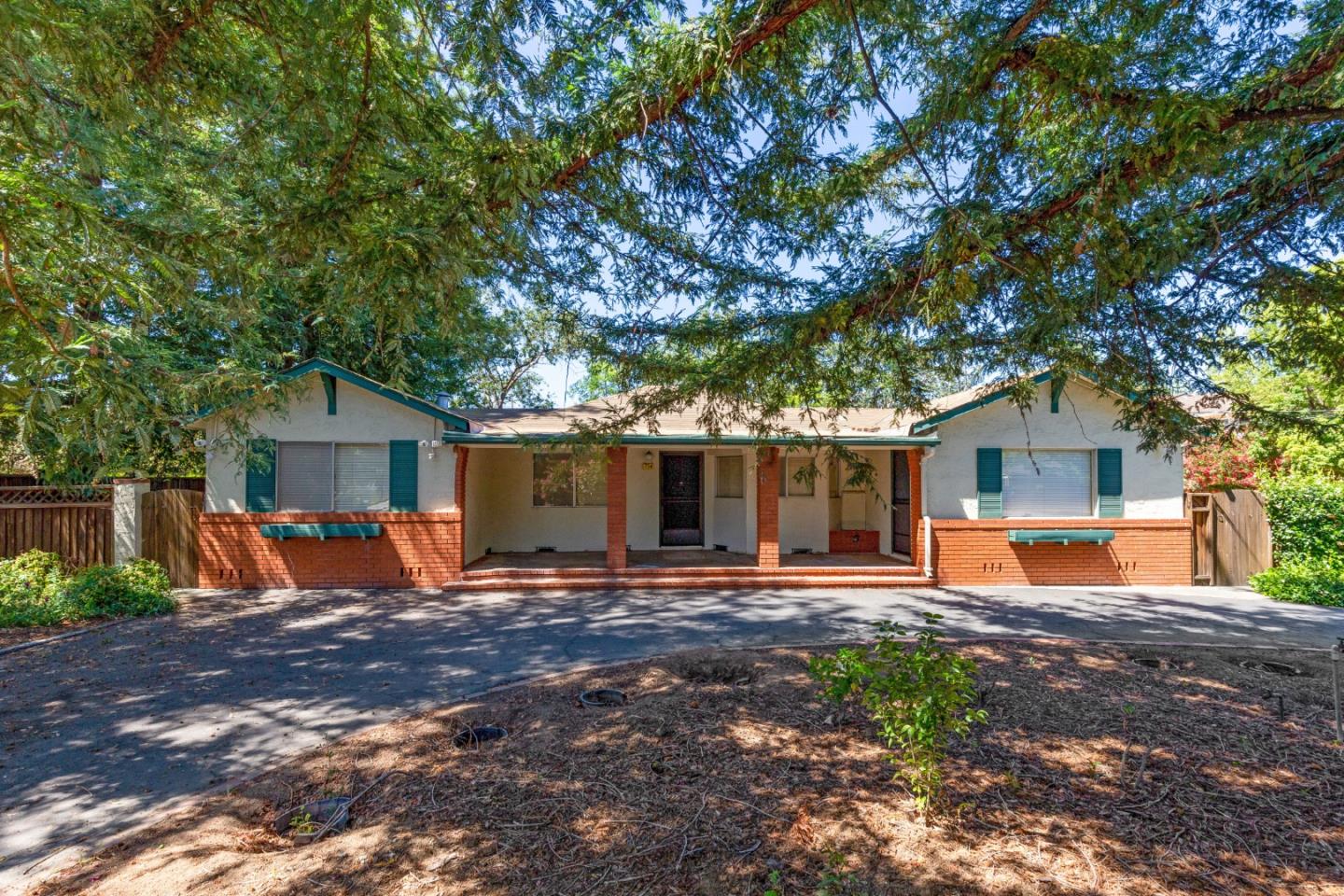 a backyard of a house with seating space
