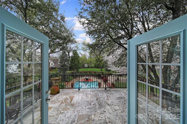 a view of house with a backyard space