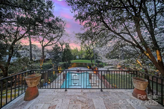 an aerial view of house with yard