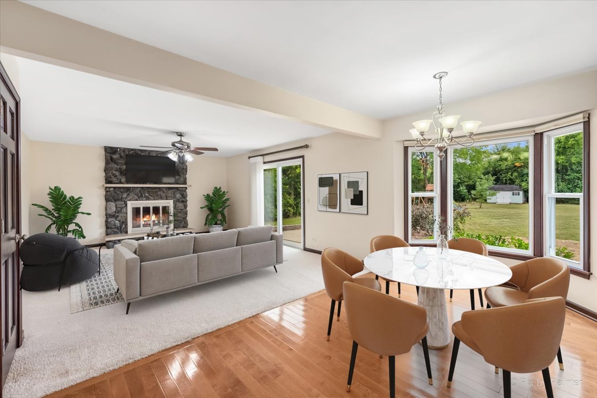 27W650 Mack Road Wheaton, IL 60189 - Photo 12 of 28 a living room with furniture and a chandelier