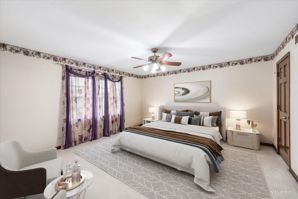 27W650 Mack Road Wheaton, IL 60189 - Photo 13 of 28 a bedroom with a bed a chandelier and a mirror