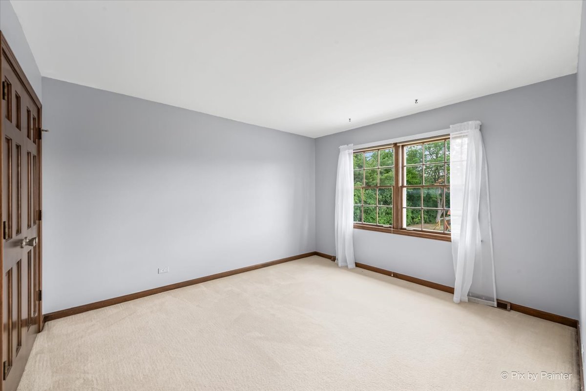 27W650 Mack Road Wheaton, IL 60189 - Photo 18 of 28 an empty room with a window