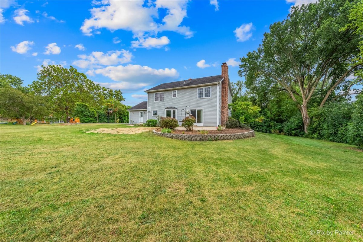 27W650 Mack Road Wheaton, IL 60189 - Photo 24 of 28 a house view with a outdoor space