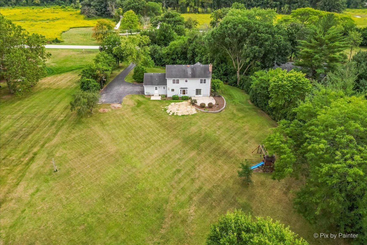 27W650 Mack Road Wheaton, IL 60189 - Photo 28 of 28 a view of a swimming pool with a patio