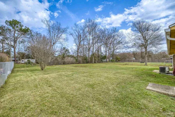 a view of a playground with basketball court
