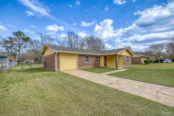 a house view with a garden space