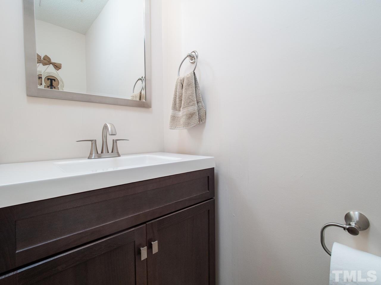 5000 Tommans Trail Raleigh, NC 27616 - Photo 12 of 30 a bathroom with a sink and a mirror