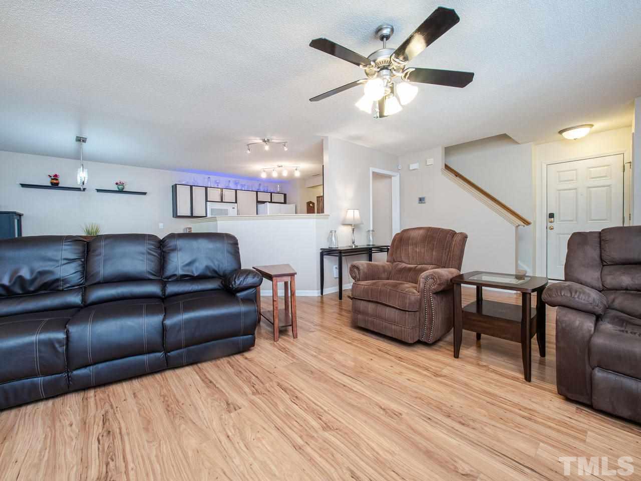 5000 Tommans Trail Raleigh, NC 27616 - Photo 13 of 30 a living room with furniture and a ceiling fan
