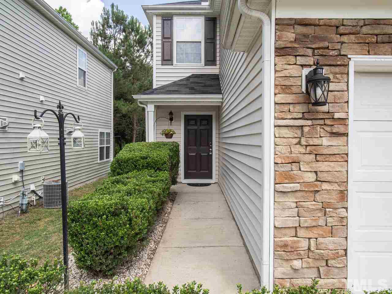 5000 Tommans Trail Raleigh, NC 27616 - Photo 3 of 30 a pathway of a house