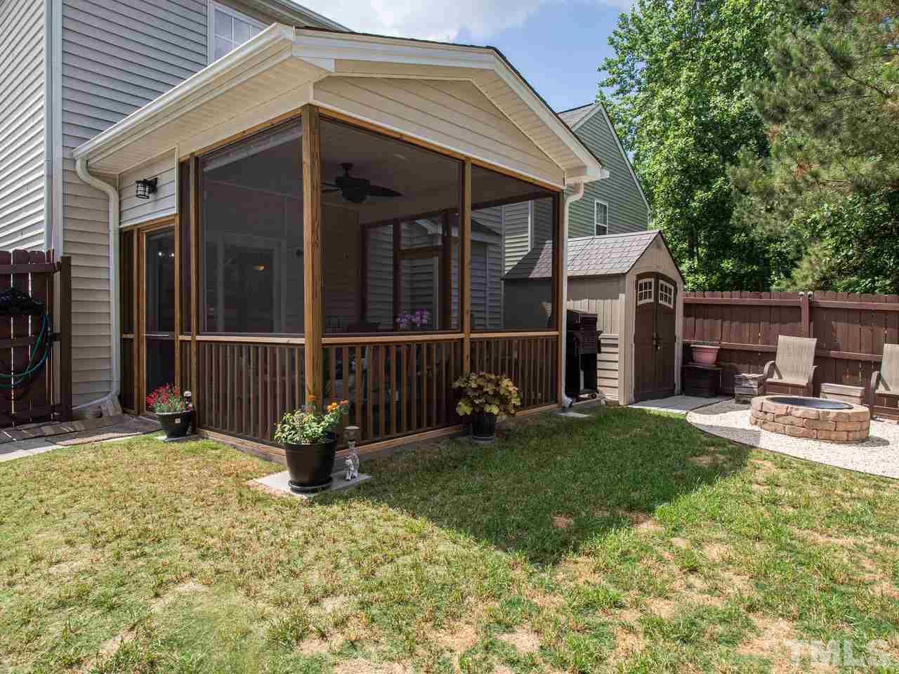 5000 Tommans Trail Raleigh, NC 27616 - Photo 25 of 30 a view of a house with backyard porch and sitting area