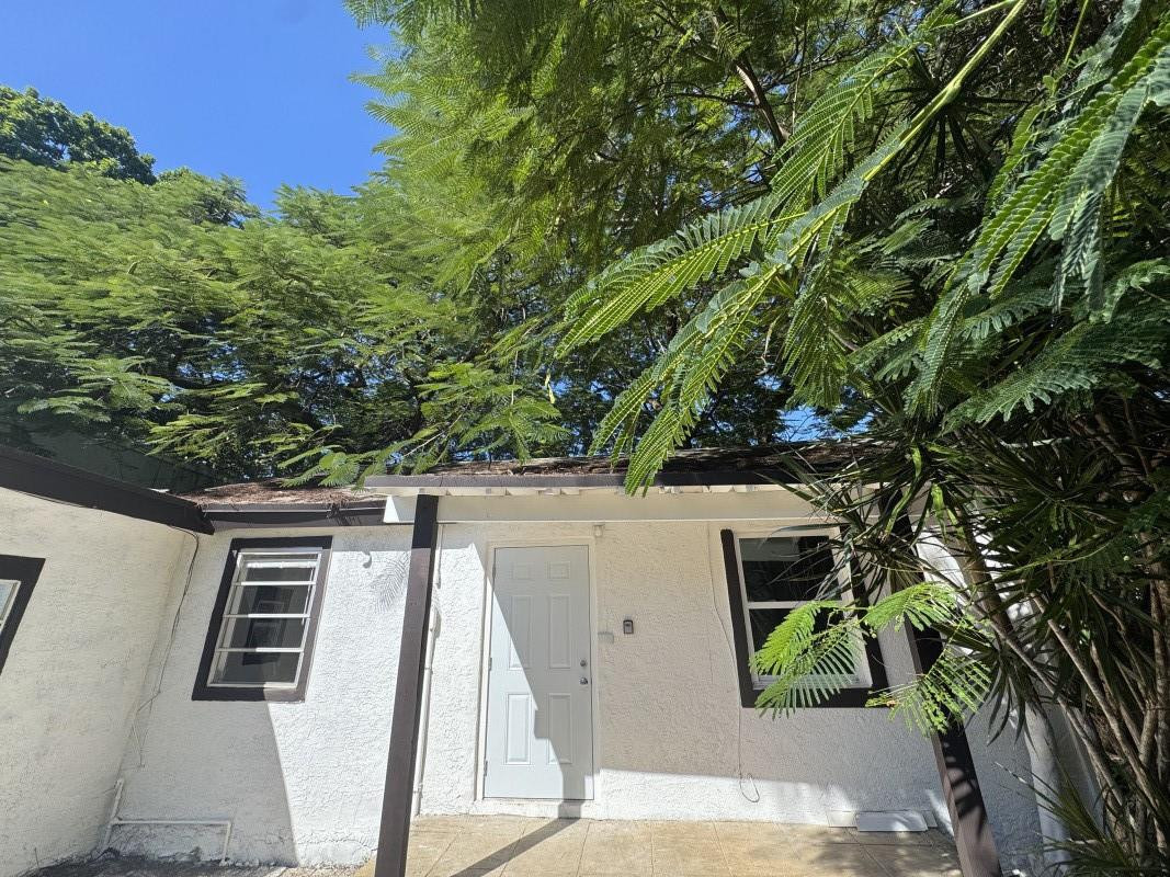 261 Northwest 81st Street, Unit B Miami, FL 33150 - Photo 3 of 12 a view of outdoor space and yard