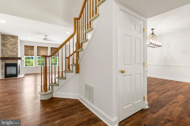 a view of entryway with wooden floor