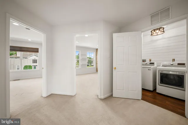 a view of utility room and washer dryer