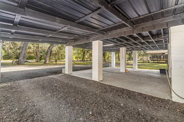 a view of a room with wooden walls