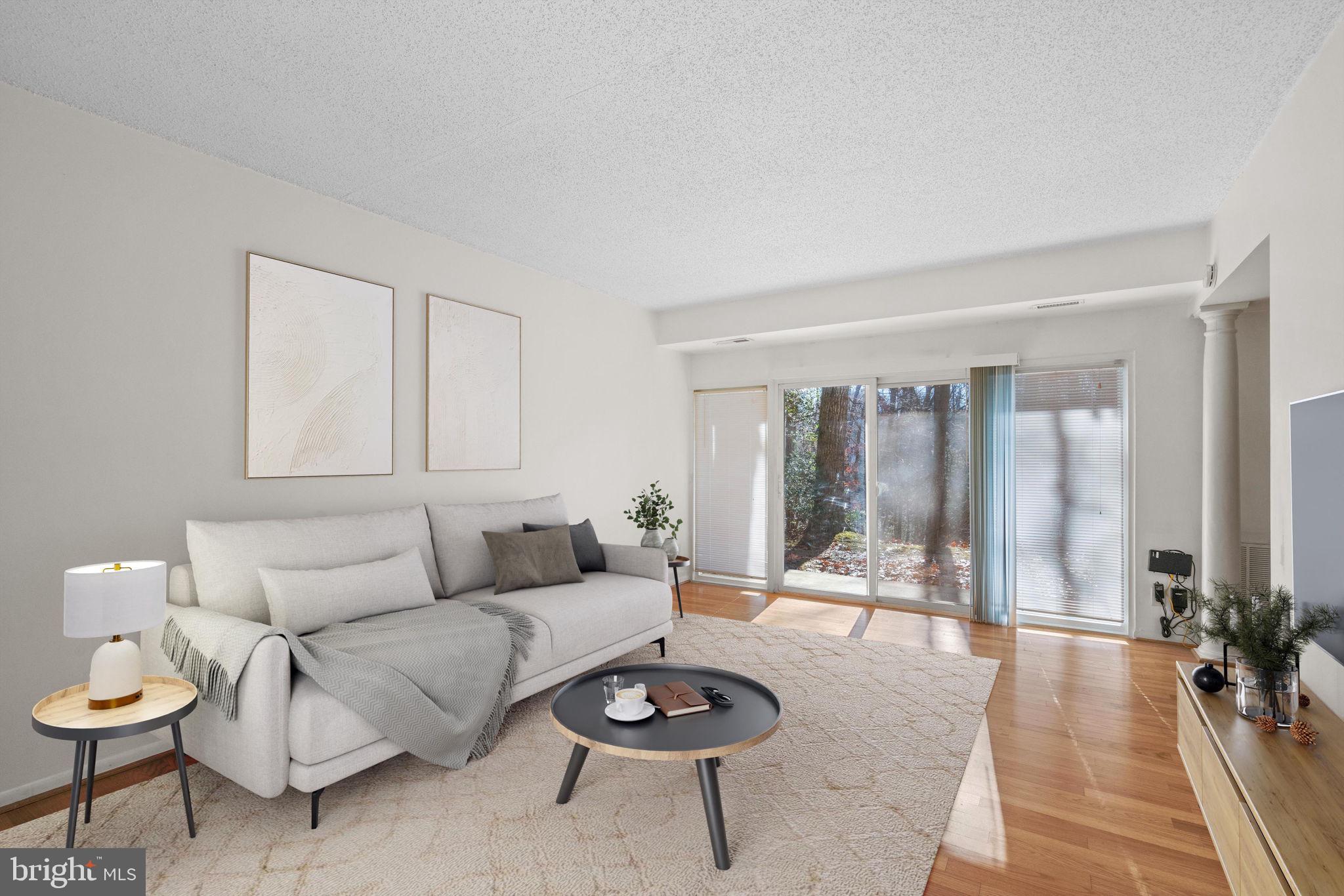 11807 Breton Court, Unit 1A Reston, VA 20191 - Photo 2 of 19 Nestle up with nature and enjoy the privacy