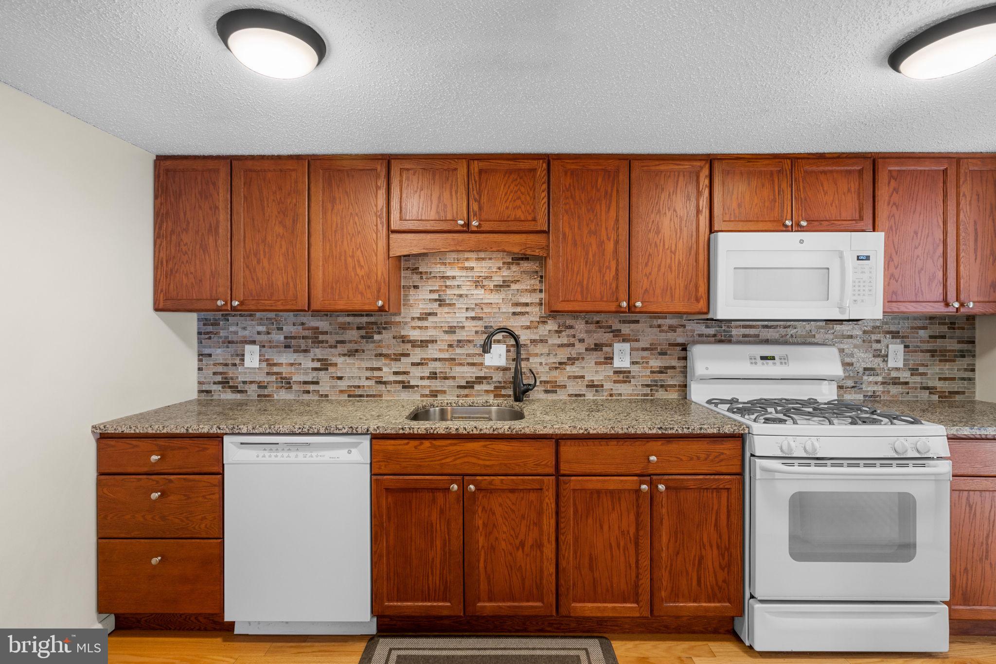 11807 Breton Court, Unit 1A Reston, VA 20191 - Photo 6 of 19 Lots of space for cook prep and entertaining