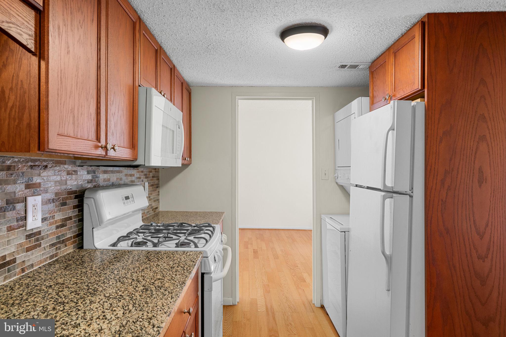 11807 Breton Court, Unit 1A Reston, VA 20191 - Photo 8 of 19 Updated appliances, including a washer and dryer!