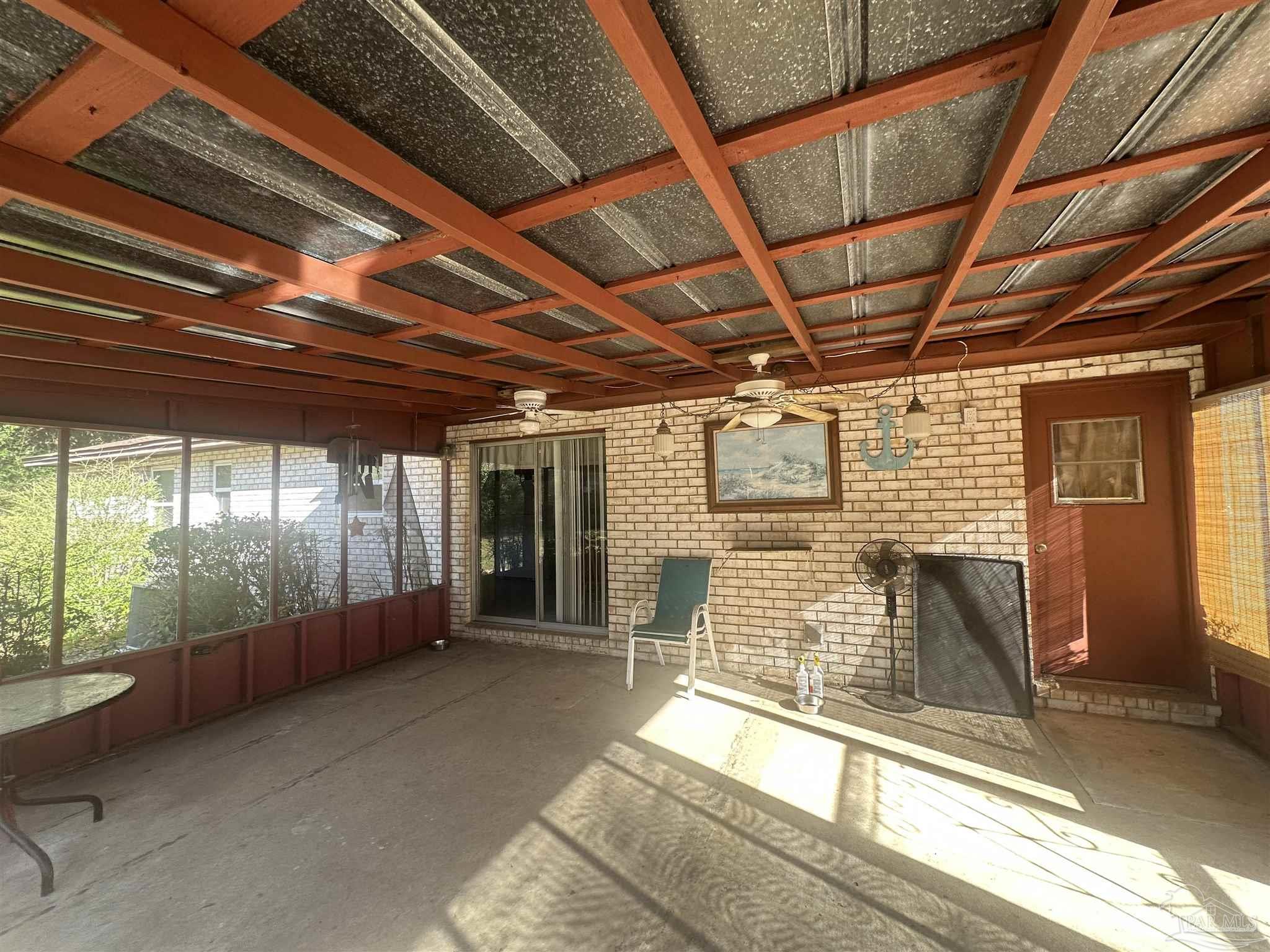 5057 Babb Lane Pace, FL 32571 - Photo 28 of 33 a view of a room with wooden floor