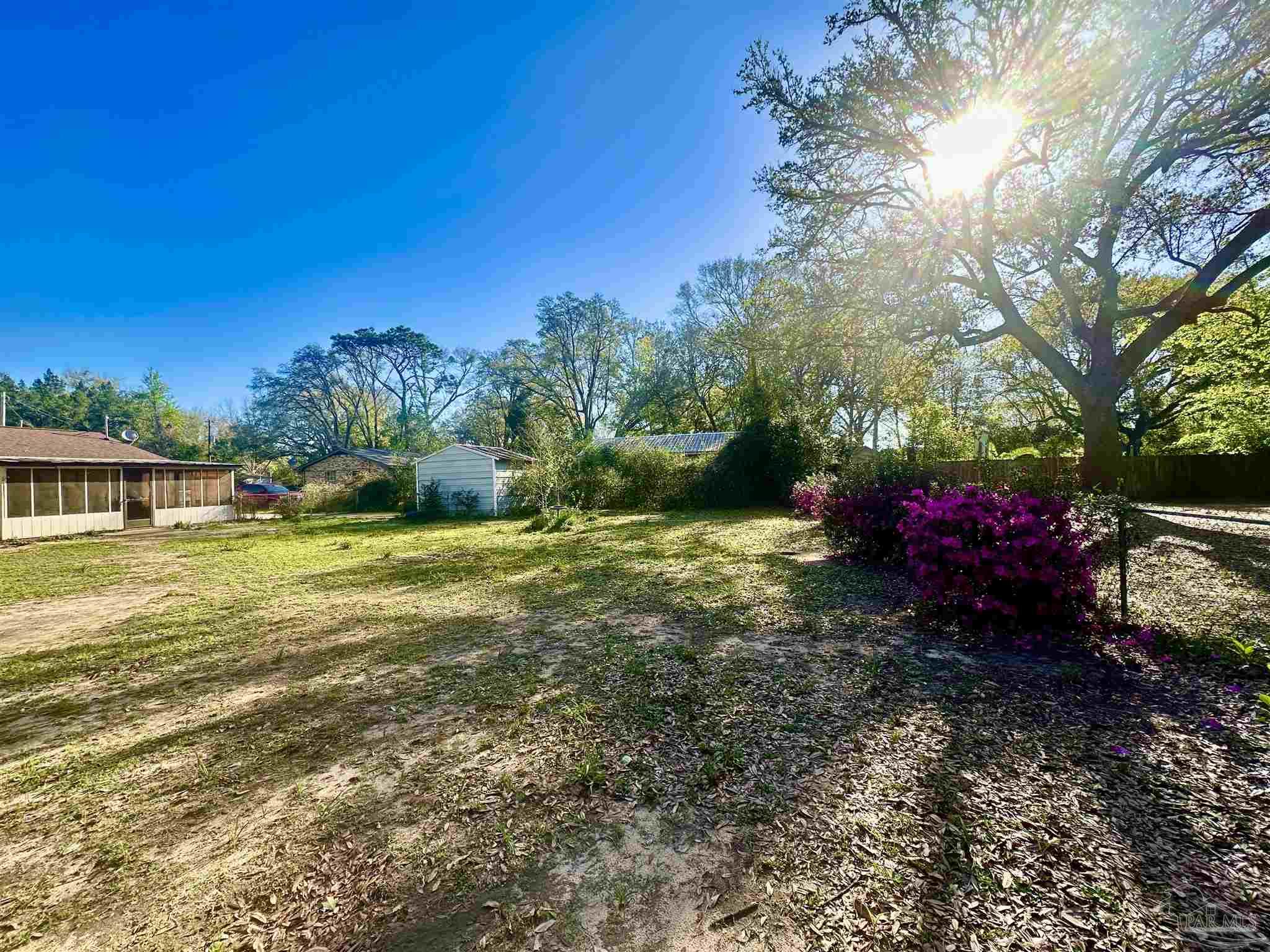 5057 Babb Lane Pace, FL 32571 - Photo 31 of 33 a view of a house with a yard