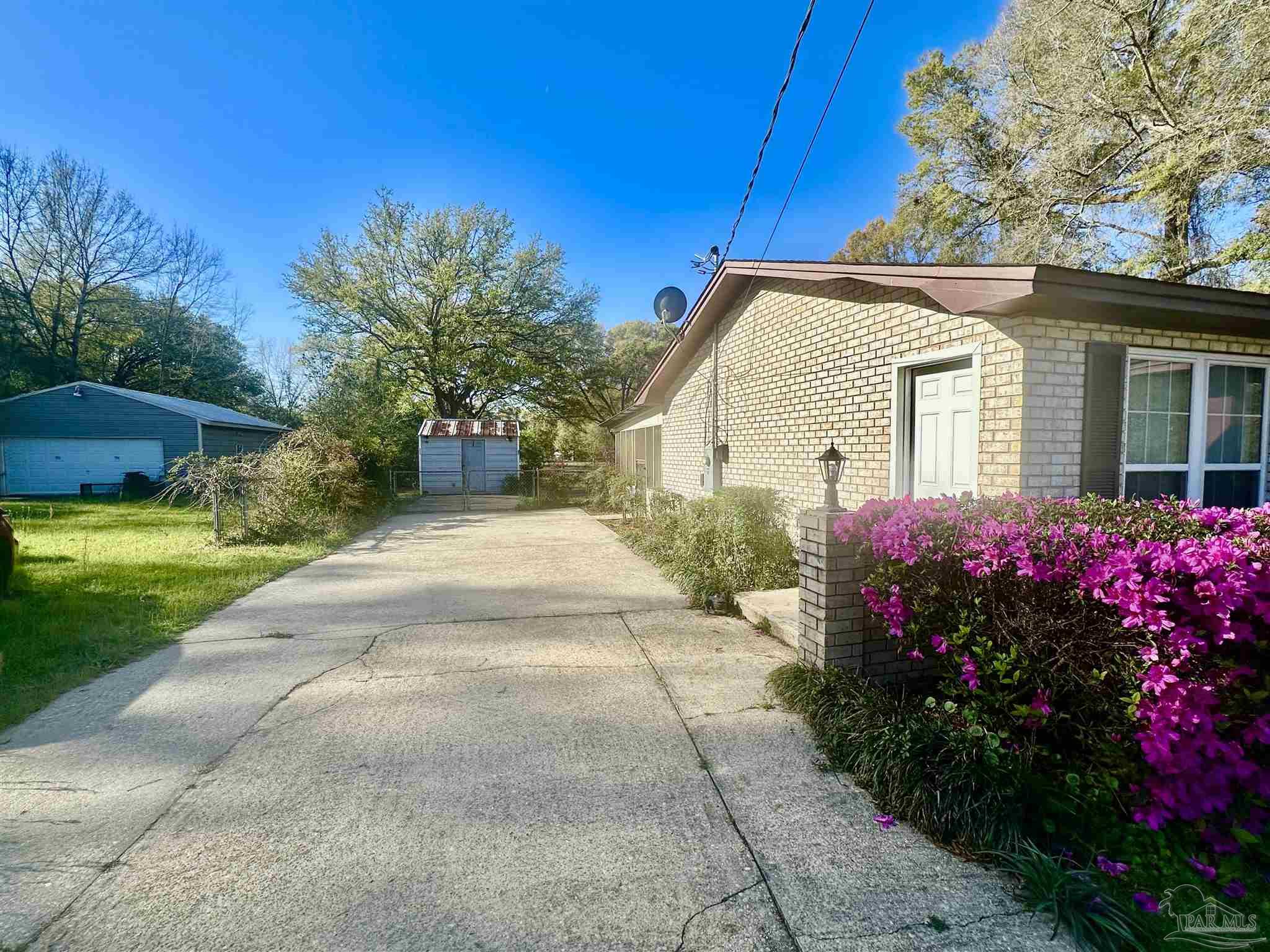 5057 Babb Lane Pace, FL 32571 - Photo 7 of 33 a view of a house with a yard