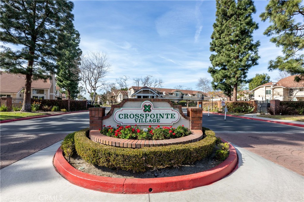 12635 Briarglen Loop, Unit H Stanton, CA 90680 - Photo 2 of 43 a view of a fire pit with tree s