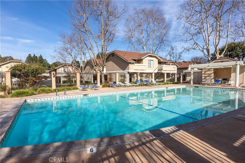 12635 Briarglen Loop, Unit H Stanton, CA 90680 - Photo 43 of 43 a front view of a house with garden
