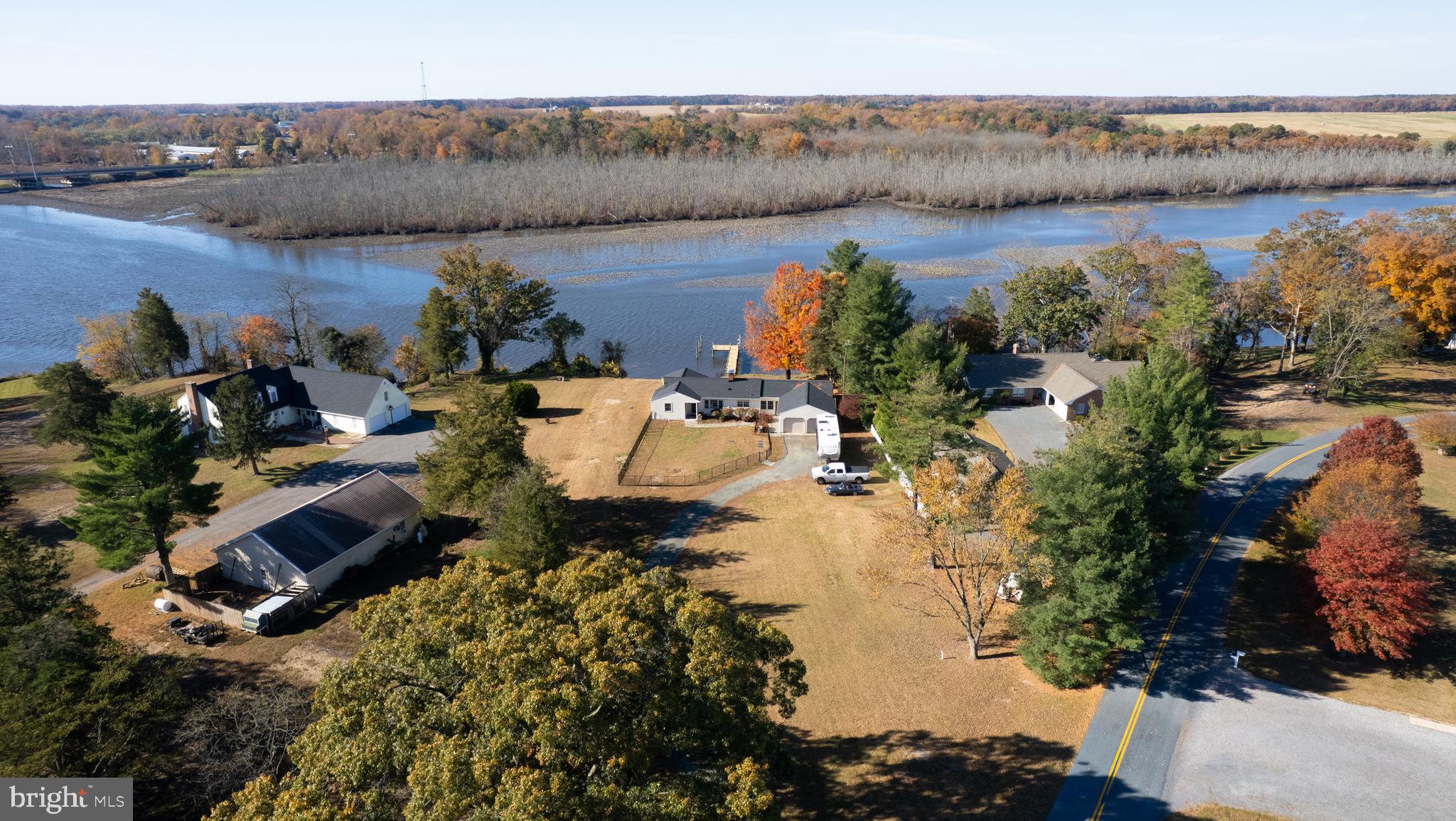 25211 Adams Landing Road Denton, MD 21629 - Photo 13 of 58 an aerial view of a house with a lake view