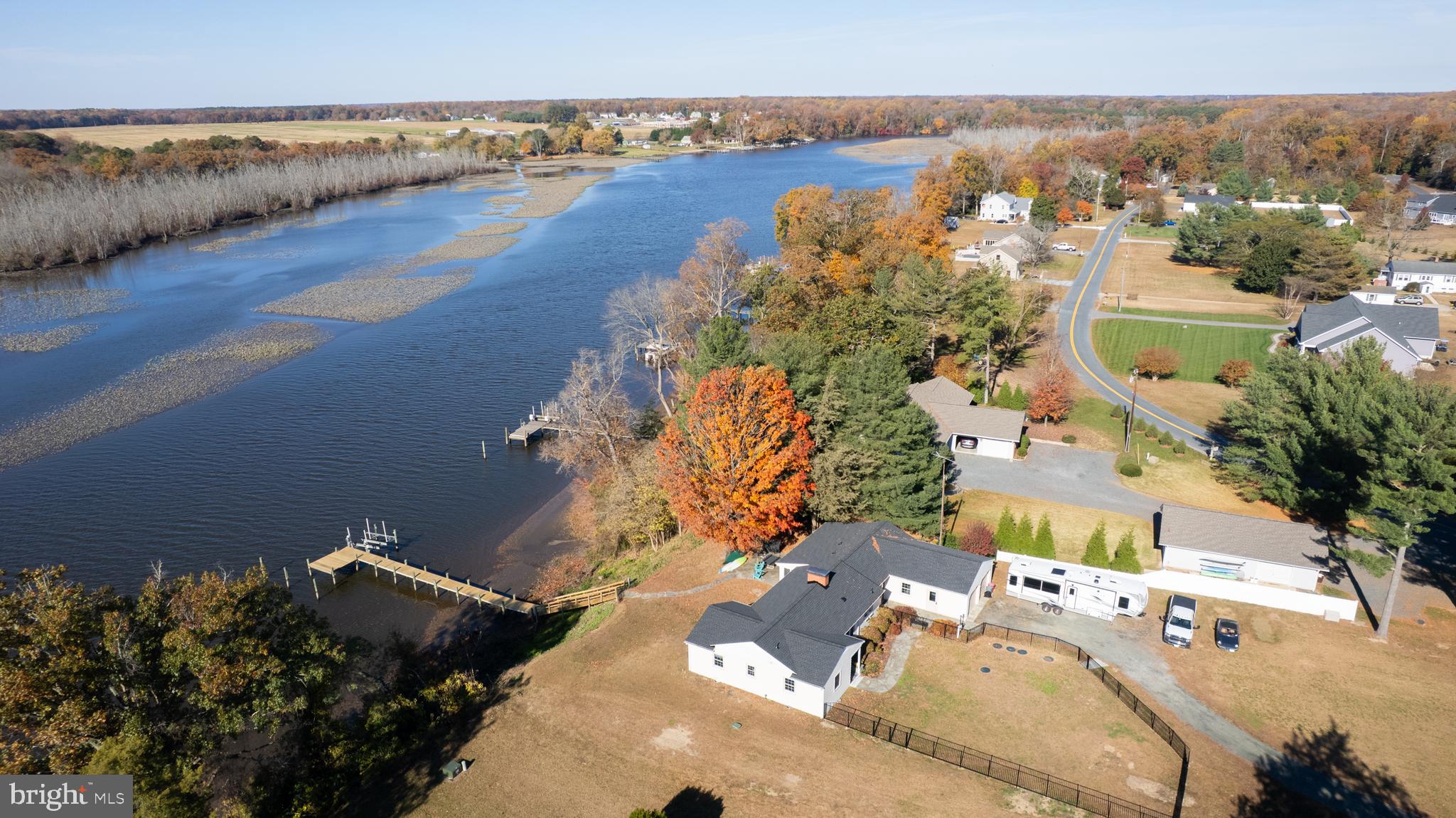 25211 Adams Landing Road Denton, MD 21629 - Photo 14 of 58 an aerial view of a house with a lake view