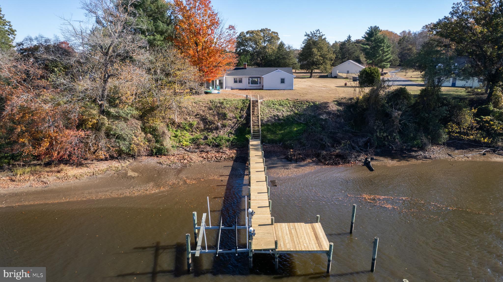 25211 Adams Landing Road Denton, MD 21629 - Photo 20 of 58 a view of a street with houses on both side of it