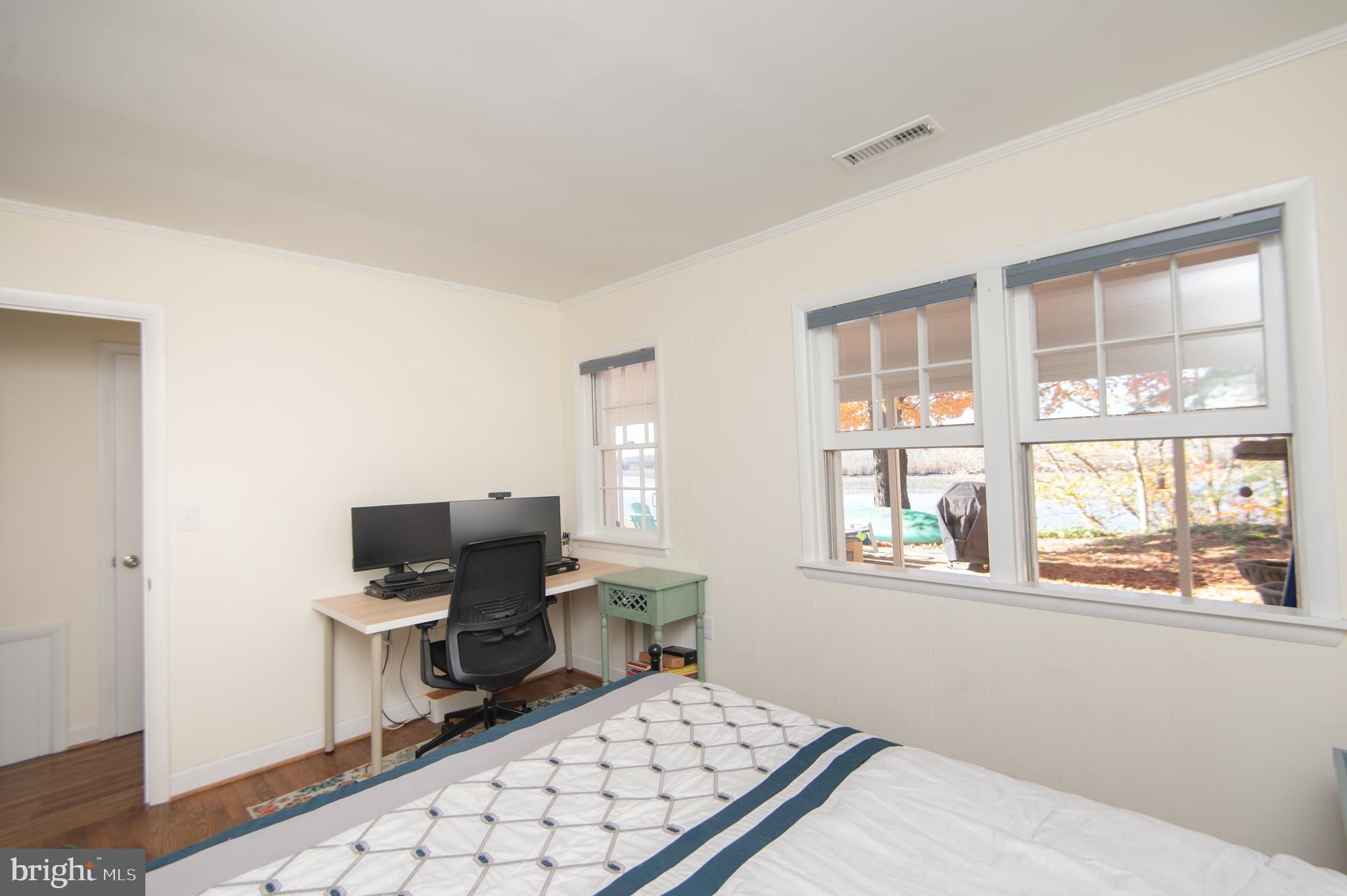 25211 Adams Landing Road Denton, MD 21629 - Photo 29 of 58 a bedroom with a bed and a window