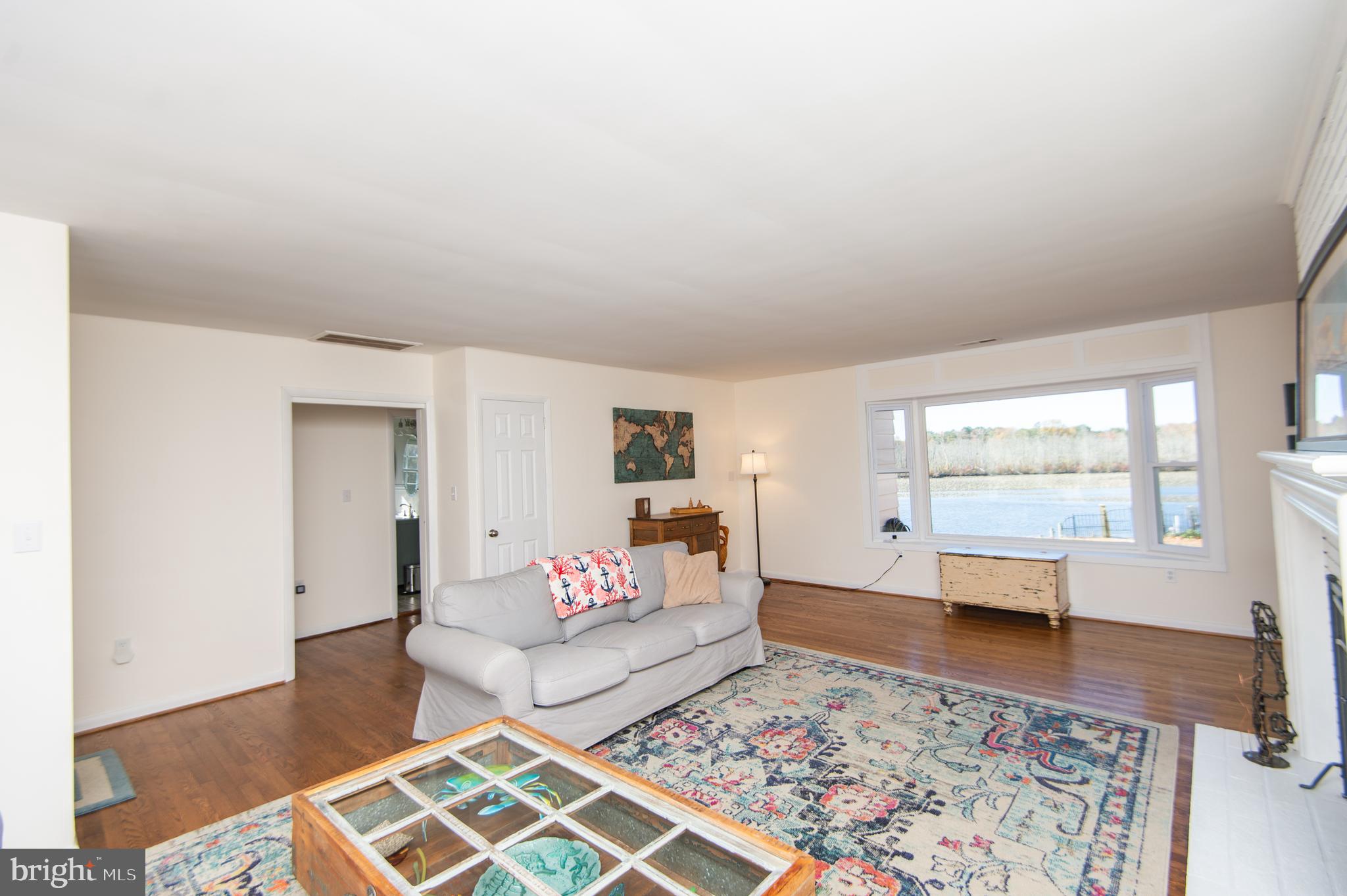 25211 Adams Landing Road Denton, MD 21629 - Photo 46 of 58 a bedroom with furniture and a window
