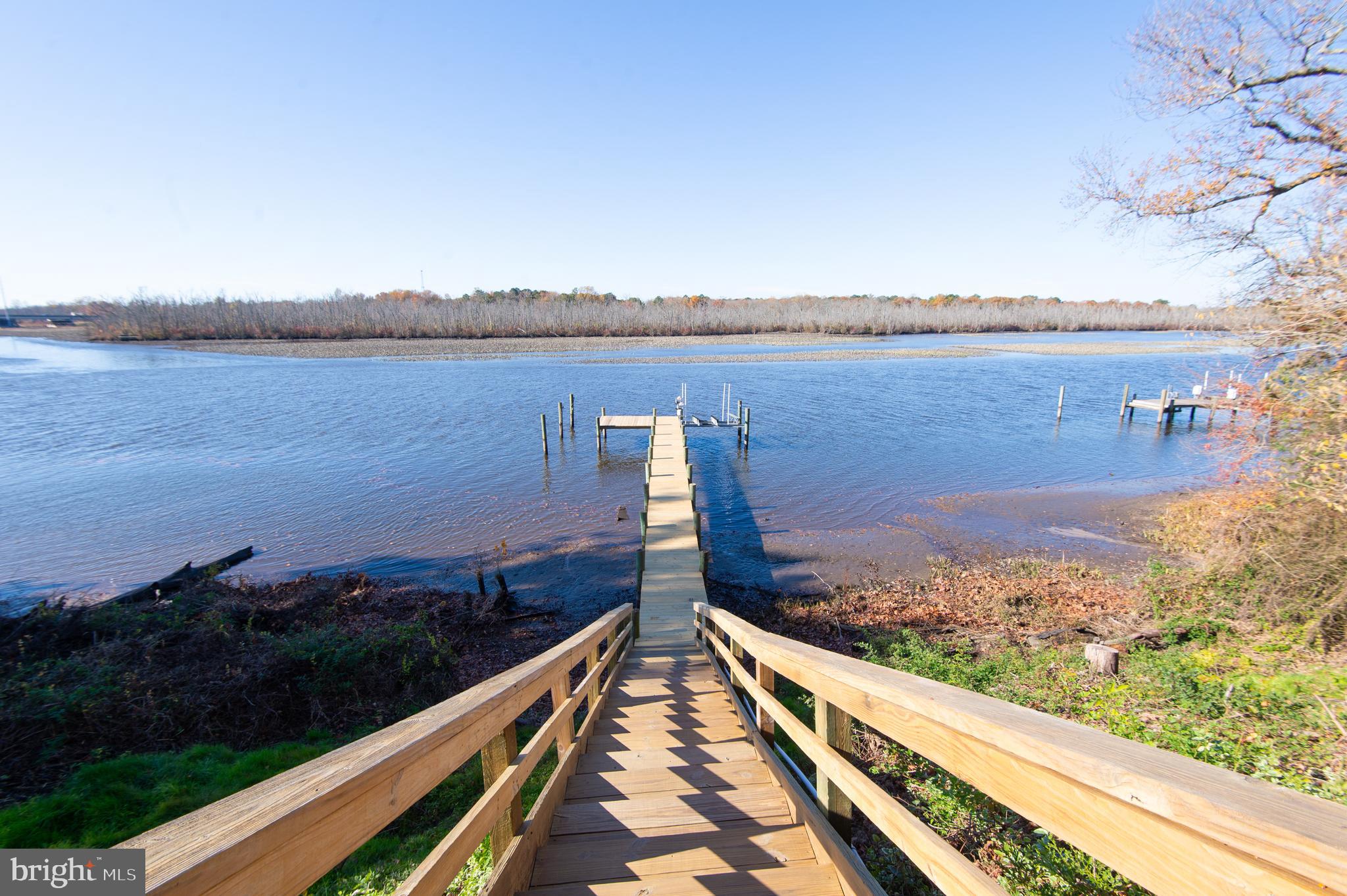 25211 Adams Landing Road Denton, MD 21629 - Photo 10 of 58 a view of balcony with furniture and city view