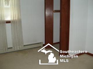 12191 Lulu Road Ida, MI 48140 - Photo 13 of 18 BEDROOM CLOSET