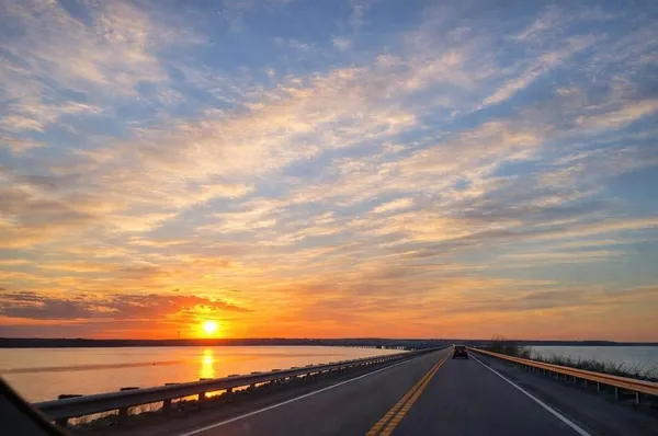 a view of an ocean and mountain
