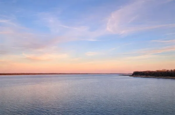 a view of road covered with trees