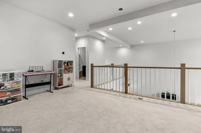 a view of a hallway with workspace