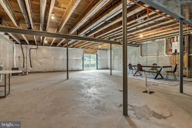 a view of a room with wooden walls