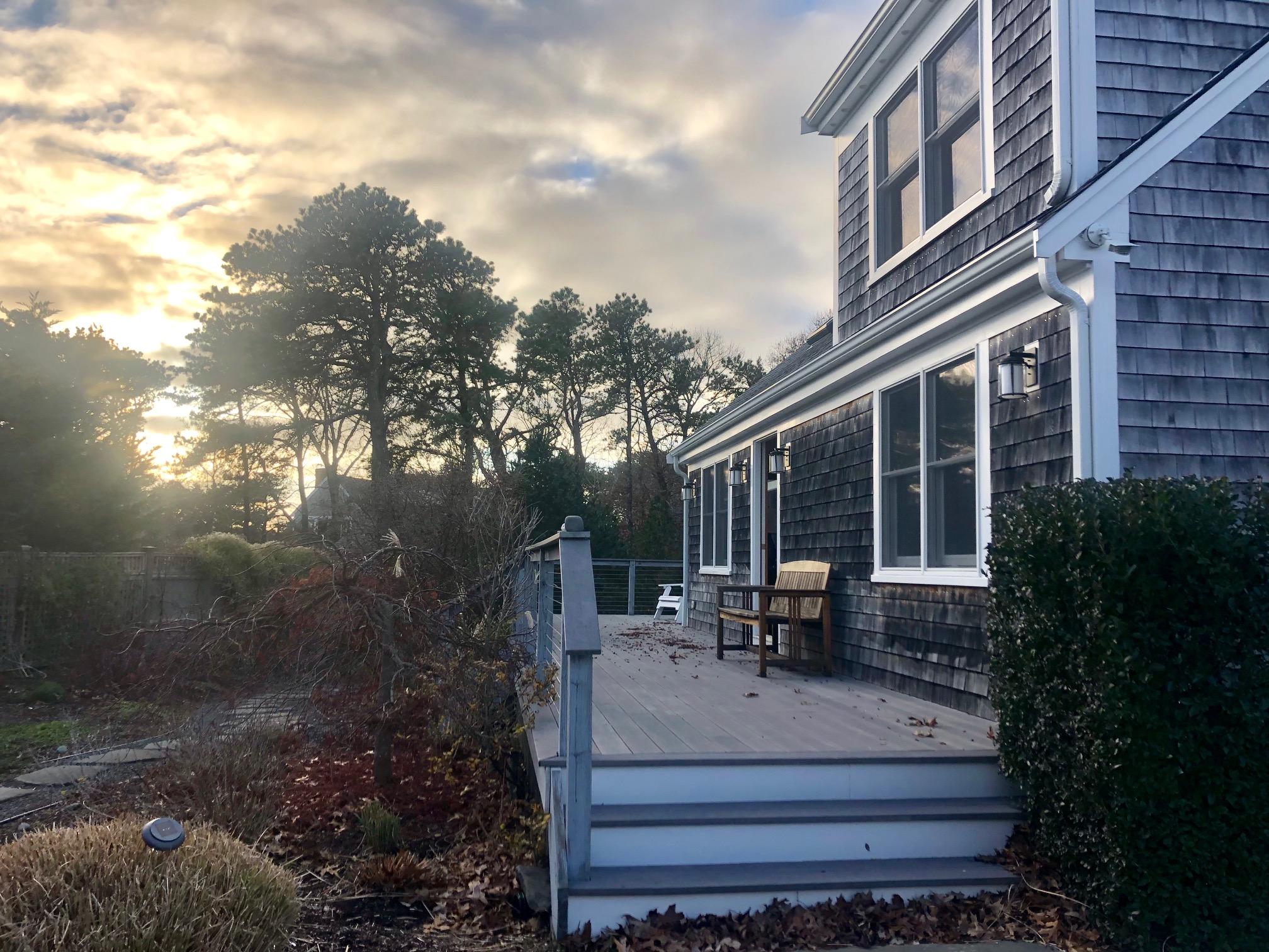 15 Clayton Road Eastham, MA 02642 - Photo 4 of 49 a view of a building with sitting area