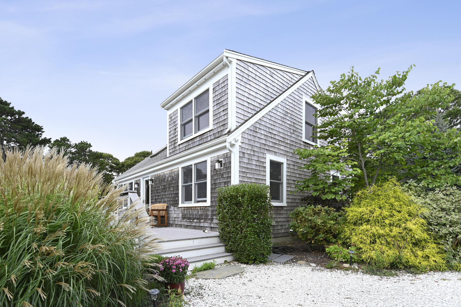 15 Clayton Road Eastham, MA 02642 - Photo 6 of 49 a view of a house with a yard