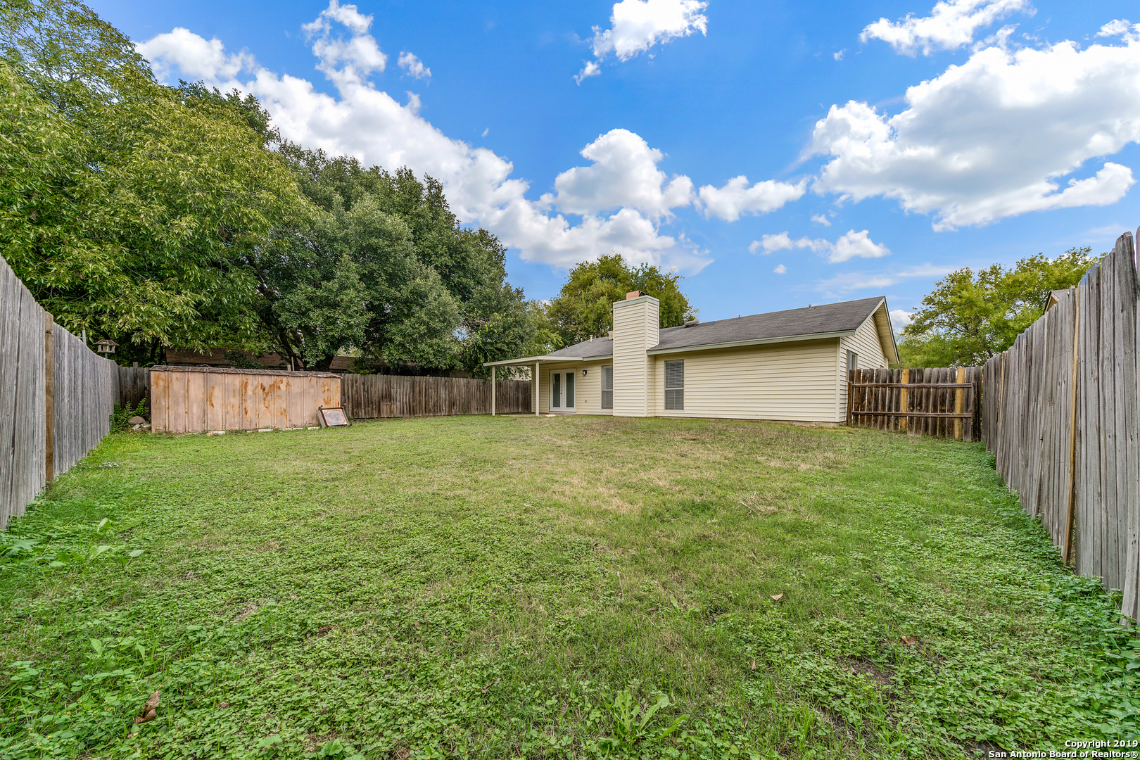 109 Meadow Way Converse, TX 78109 - Photo 23 of 25 a view of a house with backyard and garden