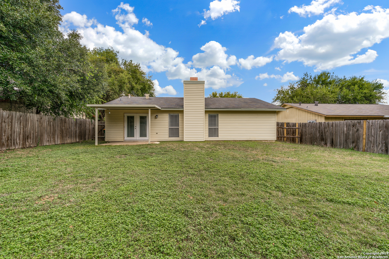 109 Meadow Way Converse, TX 78109 - Photo 24 of 25 a front view of a house with garden