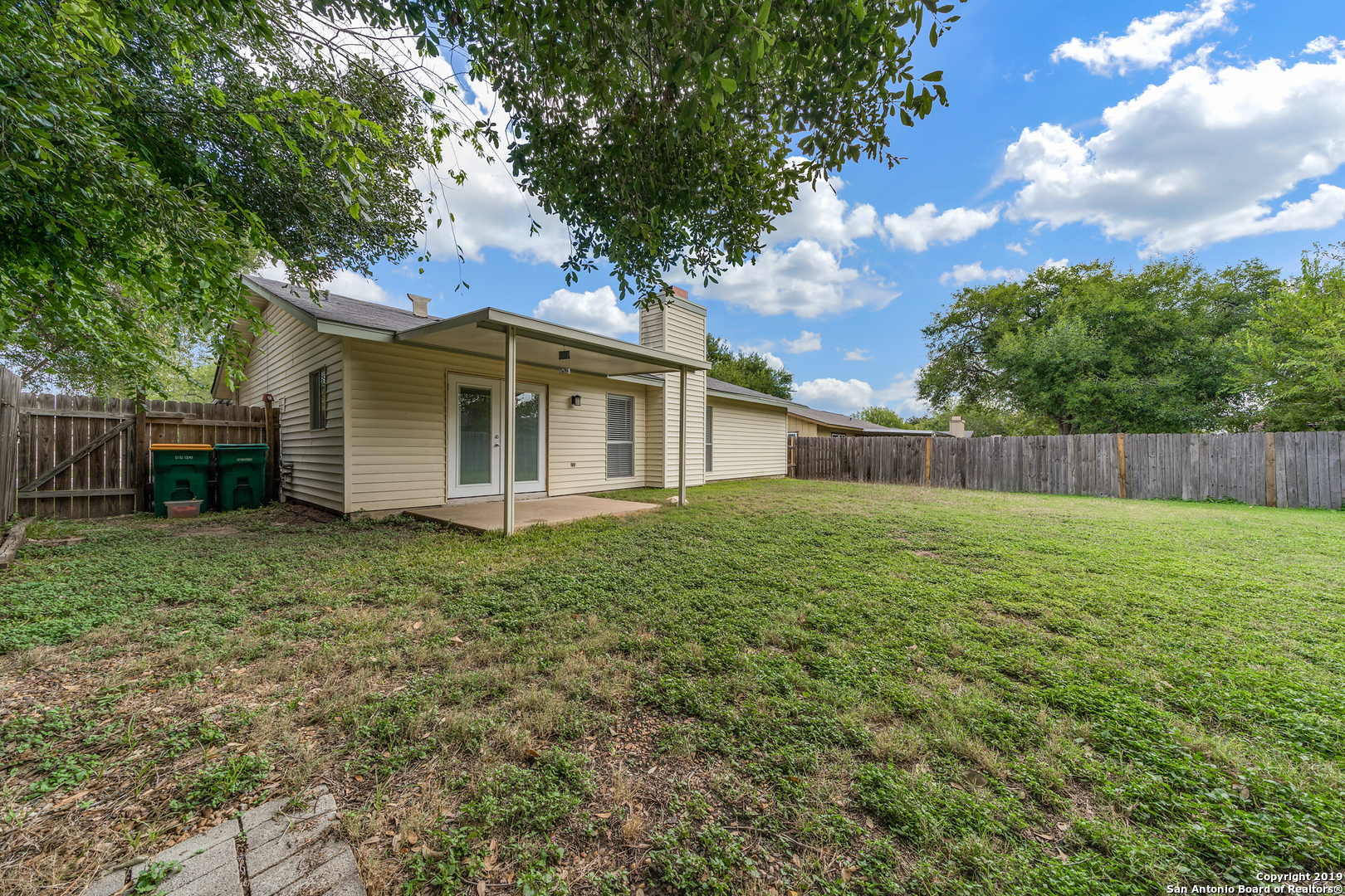 109 Meadow Way Converse, TX 78109 - Photo 25 of 25 a view of a house with a backyard
